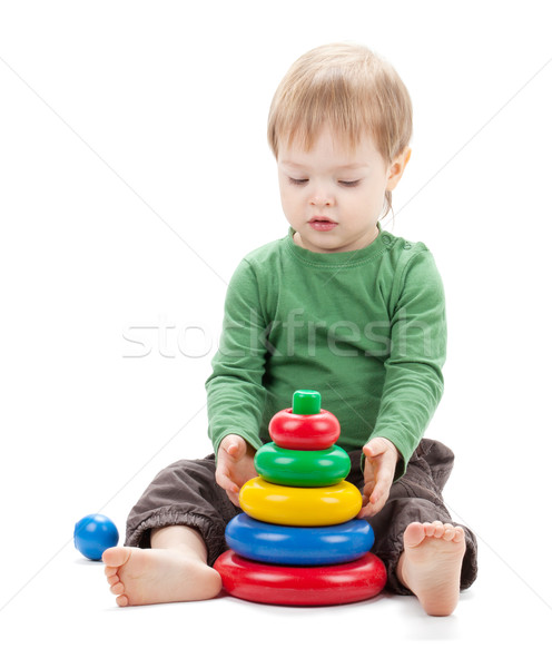 Pequeno bebê brinquedo pirâmide isolado branco Foto stock © karandaev