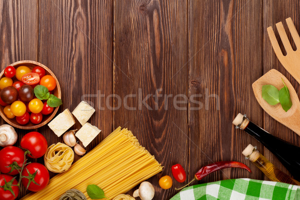 Stock photo: Italian food cooking ingredients. Pasta, vegetables, spices