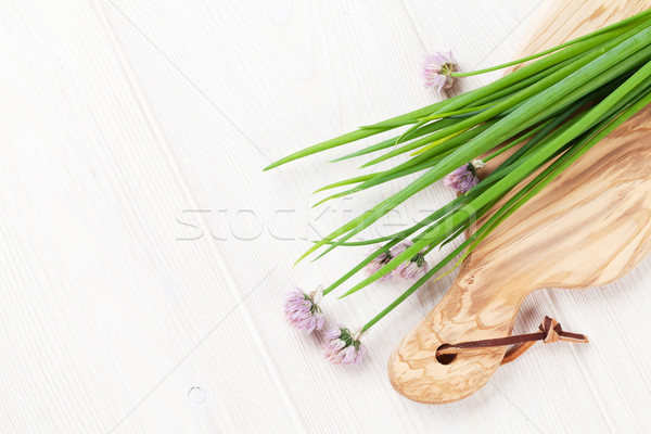 Fresh garden spring onion on white table Stock photo © karandaev