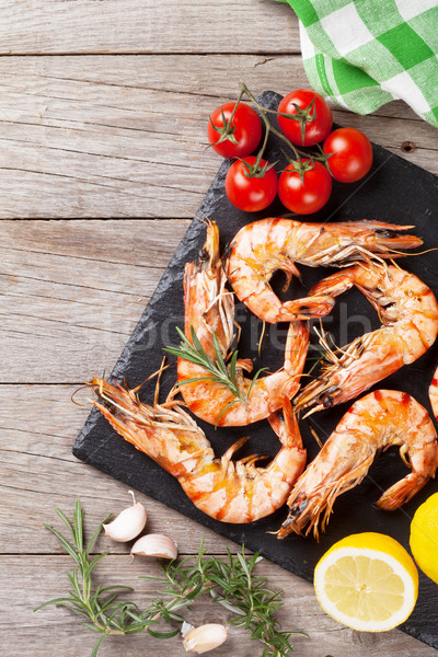 Stock photo: Grilled shrimps on stone plate
