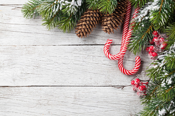 Noël neige bonbons canne table en bois [[stock_photo]] © karandaev