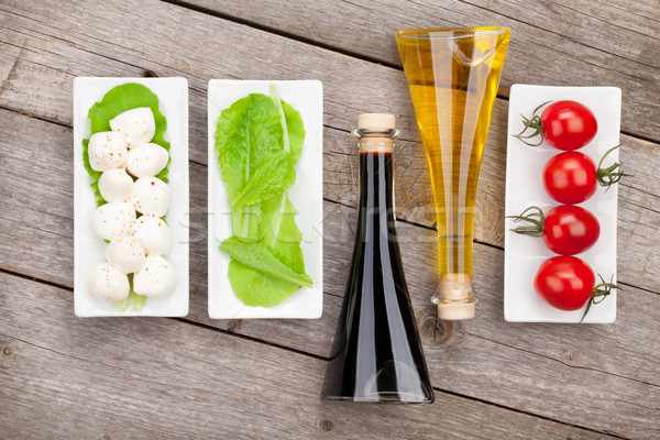 Tomates mozzarella verde ensalada hojas Foto stock © karandaev