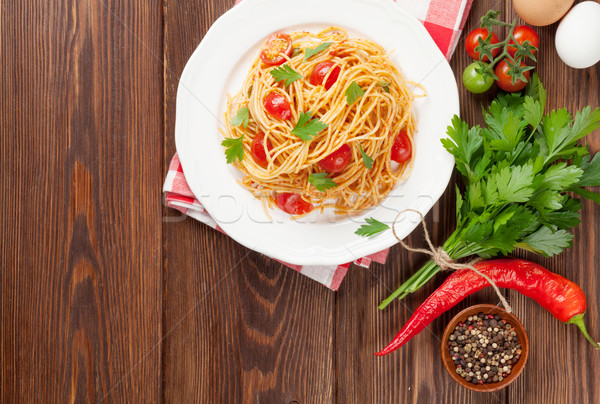 Stock photo: Spaghetti pasta with tomatoes and parsley