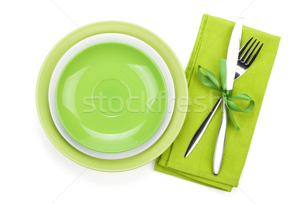 Fork with knife over towel and empty plates Stock photo © karandaev