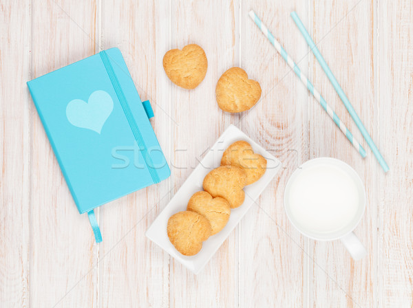 Ceaşcă lapte inimă cookie-uri Notepad Imagine de stoc © karandaev