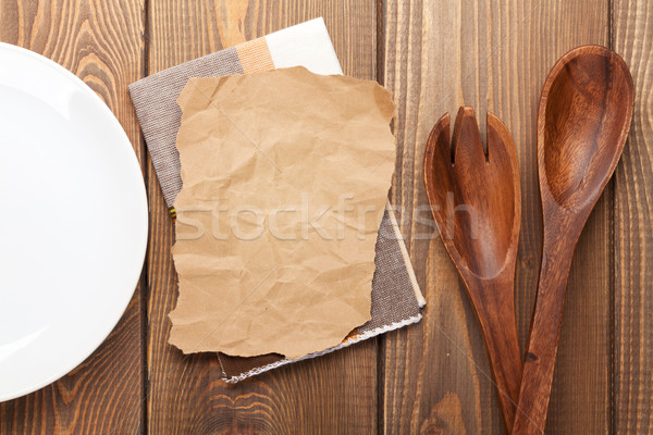 Kitchen utensils over wooden table Stock photo © karandaev