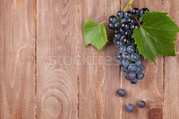Red grape on wooden table Stock photo © karandaev