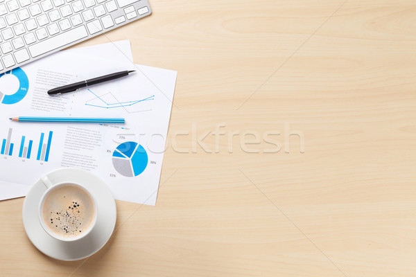 Stock photo: Office workplace with pc, charts and coffee