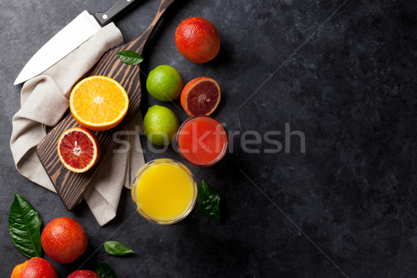 Fresh citruses and juice Stock photo © karandaev