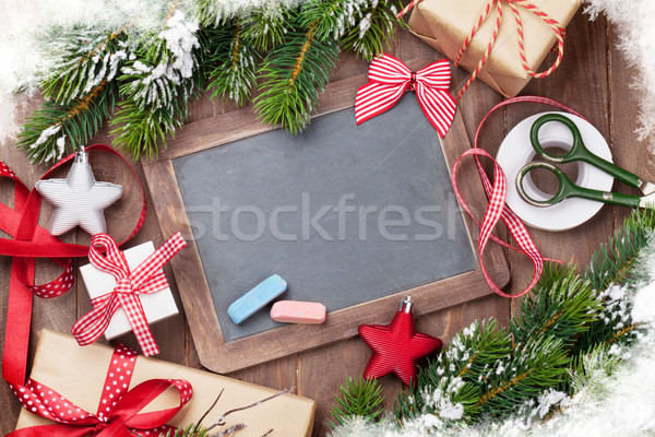 Christmas chalkboard, gift boxes, decor Stock photo © karandaev