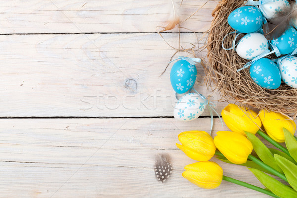 Foto d'archivio: Pasqua · colorato · uova · giallo · tulipani · bianco