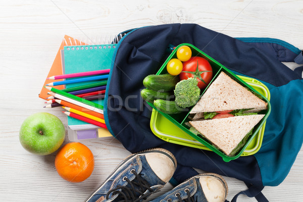 Lunch box and school supplies Stock photo © karandaev