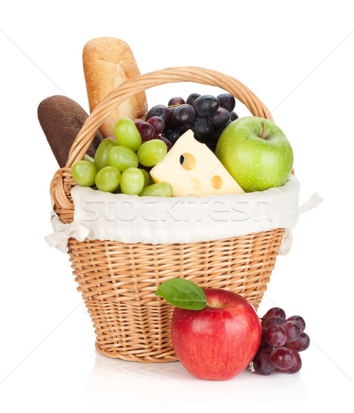 Picnic basket with bread and fruits Stock photo © karandaev