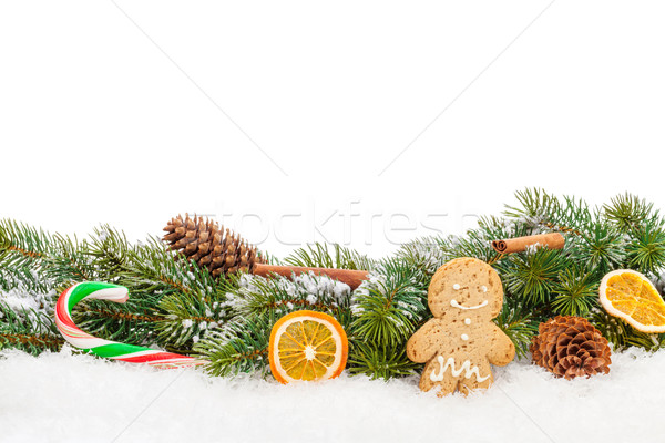 Christmas food and decor over snow fir tree Stock photo © karandaev