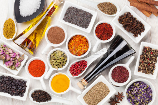 Various spices on white wooden background Stock photo © karandaev
