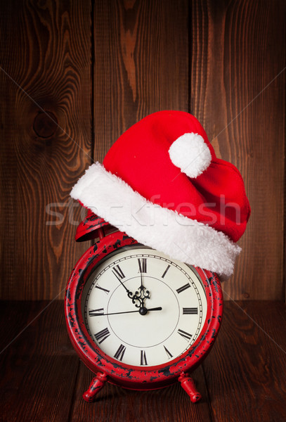 [[stock_photo]]: Noël · réveil · chapeau · table · en · bois · heureux
