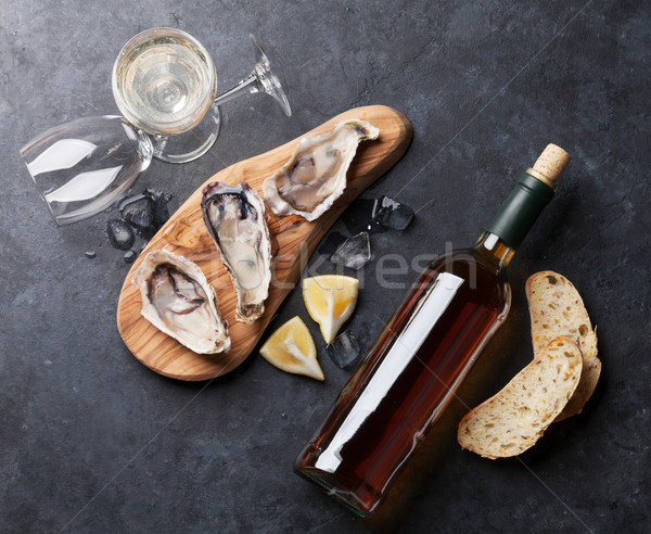 Oysters and wine Stock photo © karandaev