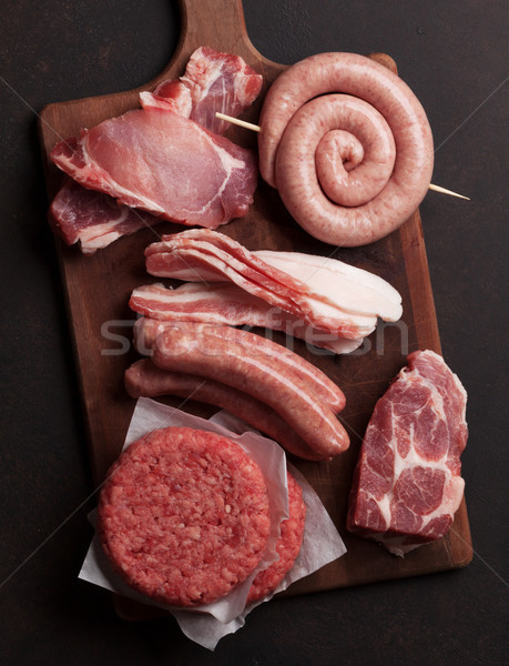 Raw meat and sausages Stock photo © karandaev