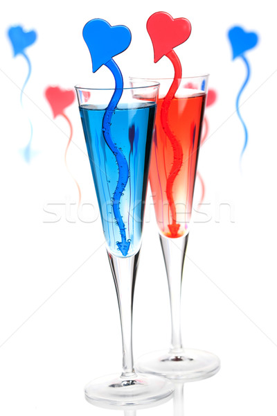 Stock photo: Two champagne alcohol cocktails with heart decoration