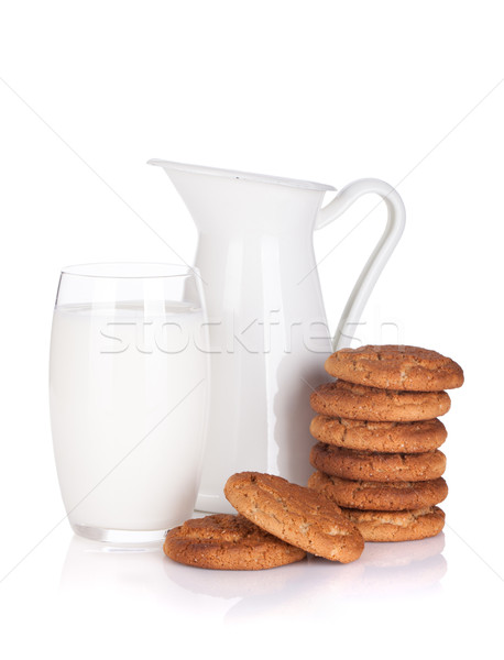 Stock photo: Milk jug, glass and cookies