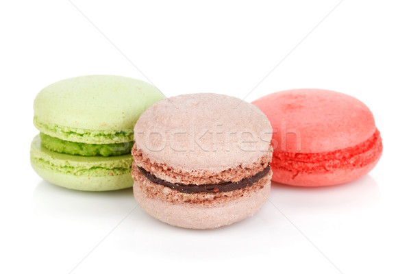 Colorat macarons izolat alb cafea fundal Imagine de stoc © karandaev