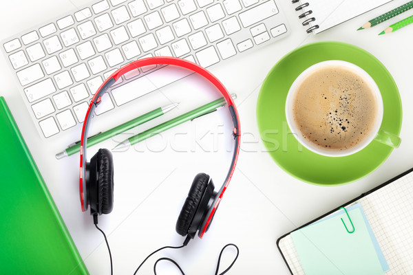 Kávéscsésze fejhallgató irodaszerek felülnézet fehér iroda Stock fotó © karandaev