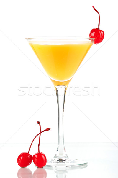 Alcohol cocktail with orange juice and three maraschino Stock photo © karandaev
