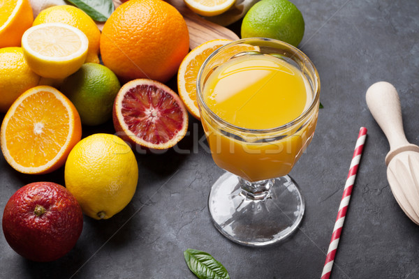 Fresh ripe citruses and juice. Lemons, limes and oranges Stock photo © karandaev
