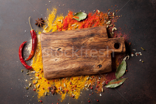 Various spices spoons and cutting board Stock photo © karandaev