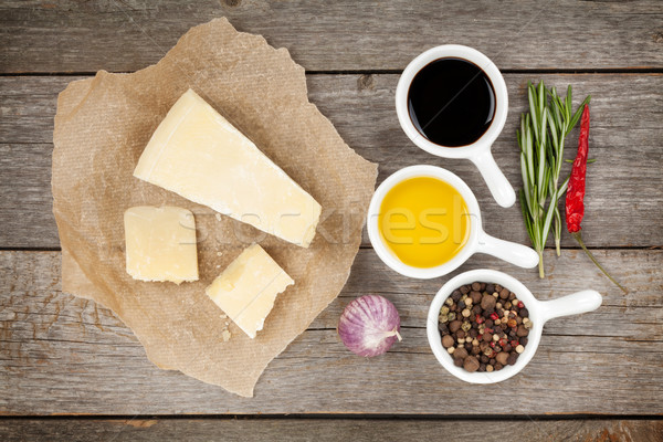 Parmezán sajt gyógynövények fűszer fa asztal papír fa Stock fotó © karandaev