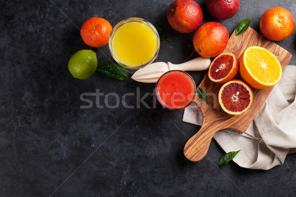 Fresh citruses and juice Stock photo © karandaev