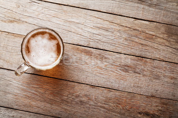 Cerveza taza mesa de madera superior vista espacio de la copia Foto stock © karandaev