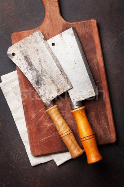 Rzeźnik vintage mięsa noże deska do krojenia kamień Zdjęcia stock © karandaev