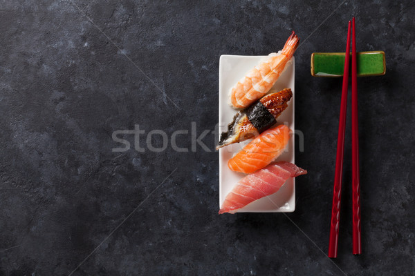 Sushi ayarlamak Çin yemek çubukları taş tablo üst Stok fotoğraf © karandaev