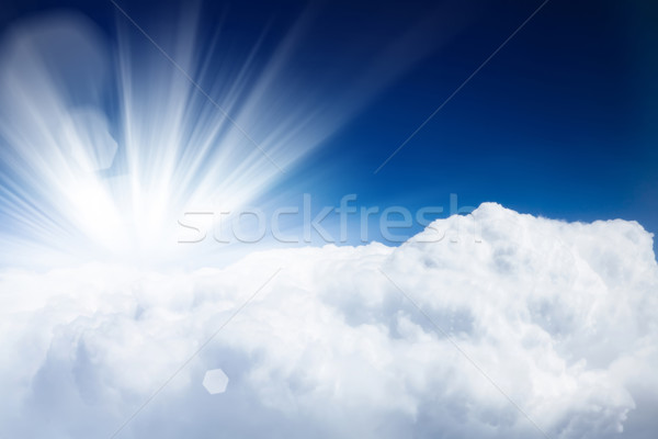 Blue sky with clouds and sun Stock photo © karandaev