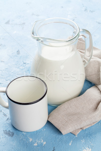 Tejesflakon csésze kő asztal tejtermékek üveg Stock fotó © karandaev