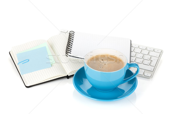 Blue coffee cup and office supplies Stock photo © karandaev