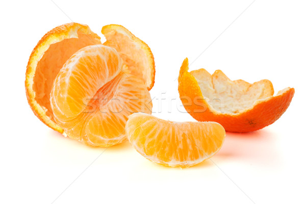Ripe tangerines segments and rind Stock photo © karandaev