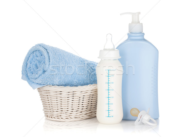 Baby milk bottle, pacifier, shampoo and towel Stock photo © karandaev