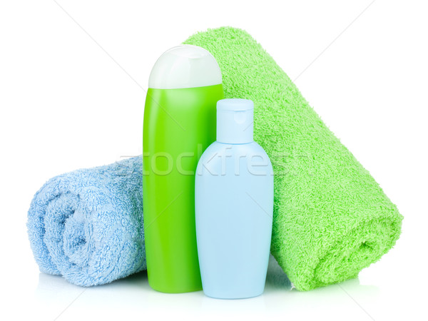 [[stock_photo]]: Bain · bouteilles · serviettes · isolé · blanche · corps