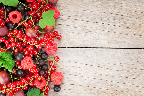 Stock photo: Fresh ripe berries on wooden table