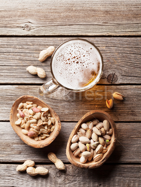 [[stock_photo]]: Bière · mug · collations · table · en · bois · haut