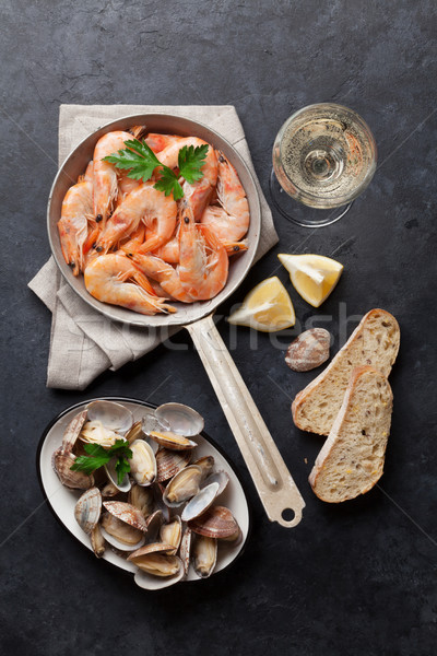 Fresh seafood and white wine Stock photo © karandaev