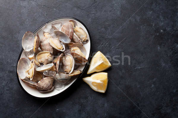 [[stock_photo]]: Fraîches · fruits · de · mer · bol · pierre · table · haut