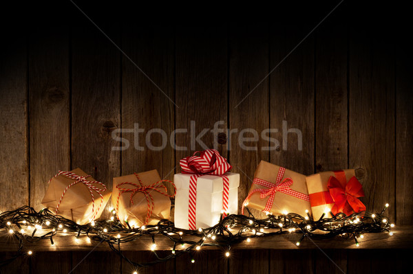Navidad luces cajas de regalo pared vista Foto stock © karandaev