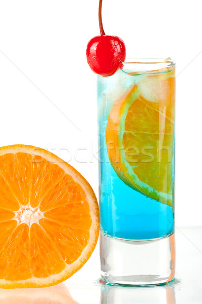 Alcohol cocktail with blue curacao, orange and maraschino Stock photo © karandaev