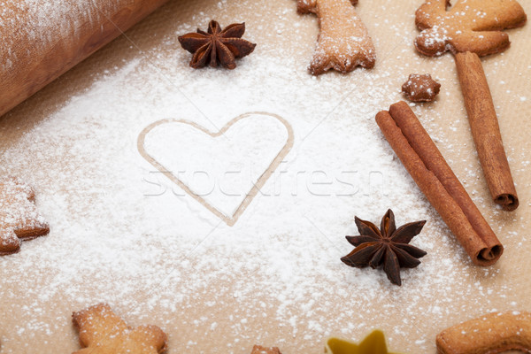 Rolling pin with flour and gingerbread cookies Stock photo © karandaev