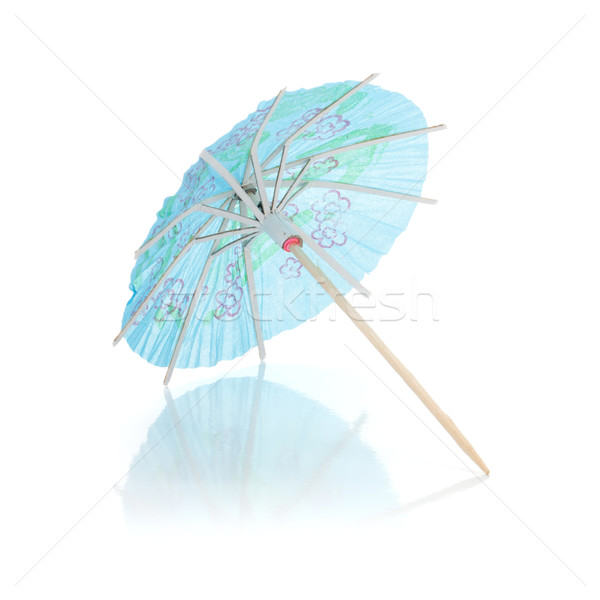 Blue cocktail umbrella Stock photo © karandaev