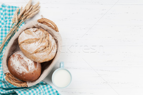 Stock photo: Homemade crusty bread and milk