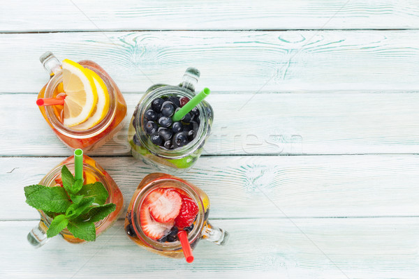 Fresh lemonade with summer fruits and berries Stock photo © karandaev